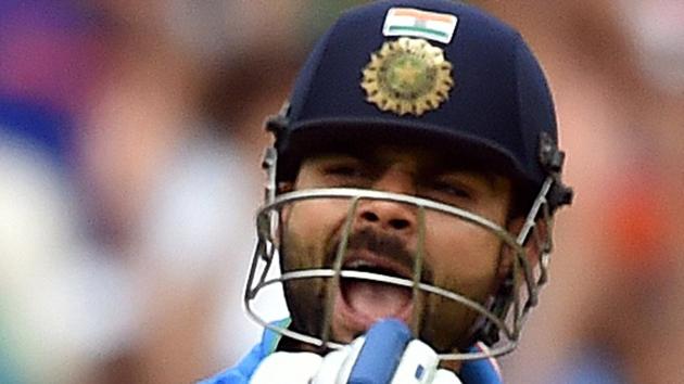 This file photo taken on February 15, 2015 shows India's batsman Virat Kohli celebrating as he reaches 100 runs against Pakistan during the Pool B 2015 Cricket World Cup match at the Adelaide Oval. India play Pakistan in the ICC Champions Trophy in Birmingham on Sunday. Catch highlights of Virat Kohli’s press conference ahead of the India vs Pakistan match(AFP)