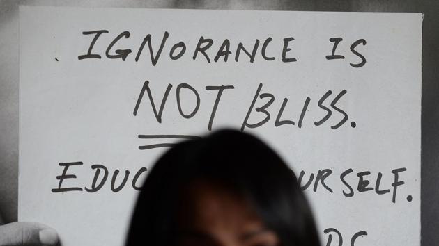 A banner reading " Ignorance is not bliss " in the backdrop as Malaysian LGBT activist Nisha Ayub speaks during an interview at SEED Foundation, an NGO she runs in Kuala Lumpur. (AFP File Photo) A banner reading " Ignorance is not bliss " in the backdrop as Malaysian LGBT activist Nisha Ayub speaks during an interview at SEED Foundation, an NGO she runs in Kuala Lumpur. (AFP File Photo)