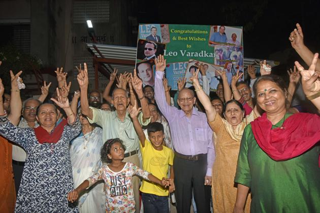 Manohar Varadkar (in green shirt) and family members celebrate Leo Varadkar’s victory at Borivli on Friday.(Pratik Chorge)