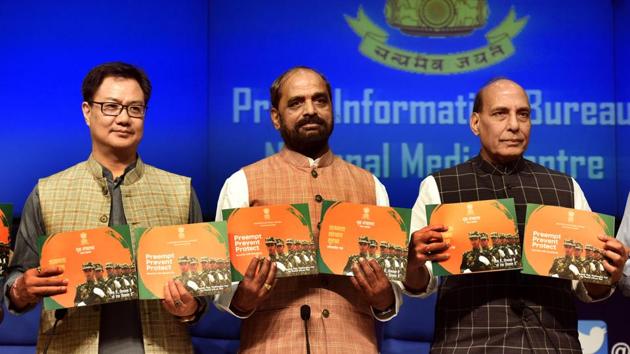 Minister of state Kiren Rijiju, minister of state Hansraj Ahir and home minister Rajnath Singh at a press conference on initiatives related to the home ministry in New Delhi on Saturday. (Sonu Mehta/HT PHOTO) Minister of state Kiren Rijiju, minister of state Hansraj Ahir and home minister Rajnath Singh at a press conference on initiatives related to the home ministry in New Delhi on Saturday. (Sonu Mehta/HT PHOTO)
