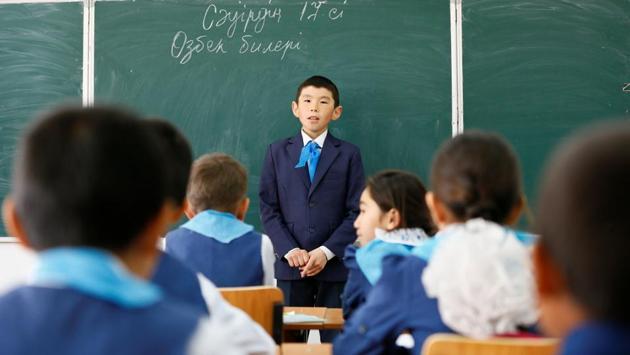 Students attend a lesson at a school in the village of Bogen. (Shamil Zhumatov / REUTERS) 