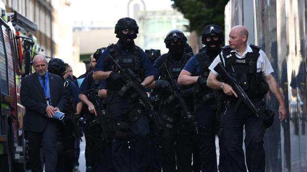 Armed police officers arrive at The Shard in the London Bridge quarter in London on Sunday, following a terror attack. (AFP) Armed police officers arrive at The Shard in the London Bridge quarter in London on Sunday, following a terror attack. (AFP)