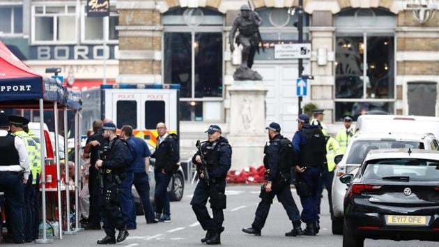 Armed police muster on Borough High Street, close to Borough Market in London. (AFP Photo) Armed police muster on Borough High Street, close to Borough Market in London. (AFP Photo)