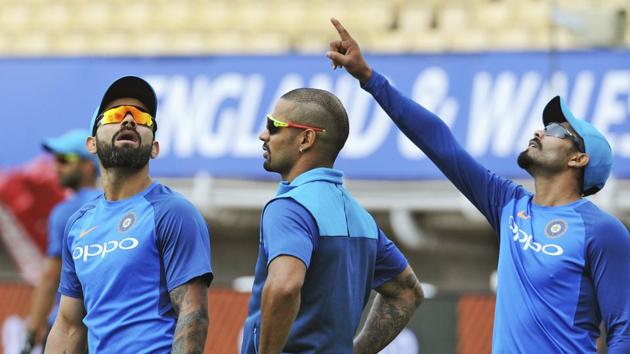 Virat Kohli, Shikhar Dhawan and Ravindra Jadeja during a practice session ahead of India vs Pakistan ICC Champions Trophy 2017 clash.(AP)