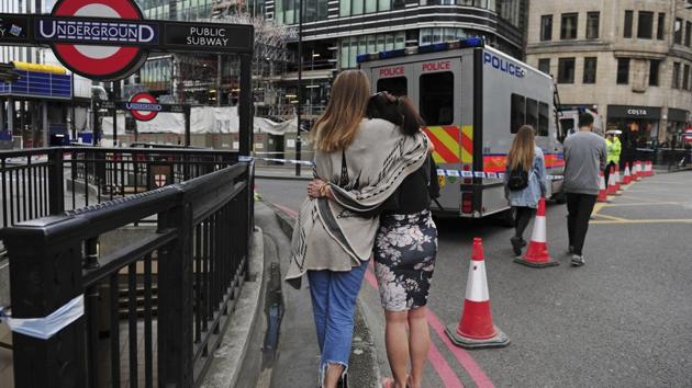 Two women hug after bringing flowers to add to tributes laid on the north side of London Bridge following last night's terrorist incident, Sunday, June 4, 2017. (AP Photo) Two women hug after bringing flowers to add to tributes laid on the north side of London Bridge following last night's terrorist incident, Sunday, June 4, 2017. (AP Photo)