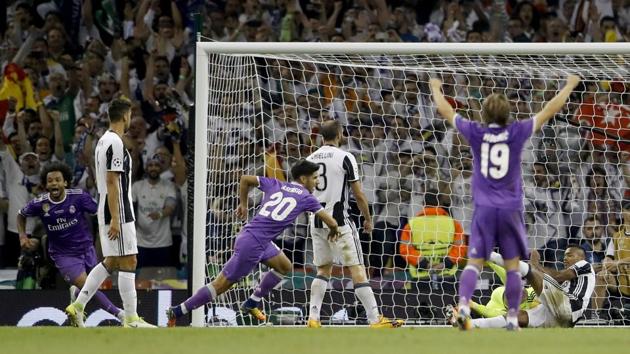 Real Madrid's Marco Asensio then hit the final nail of Juventus’ coffin with a goal in the dying minutes. (AP) Real Madrid's Marco Asensio then hit the final nail of Juventus’ coffin with a goal in the dying minutes. (AP)