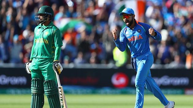 Virat Kohli celebrates as Ravindra Jadeja takes the wicket of Azhar Ali during the ICC Champions Trophy match between India and Pakistan at Edgbaston. Catch full cricket score of India vs Pakistan here(Getty Images)