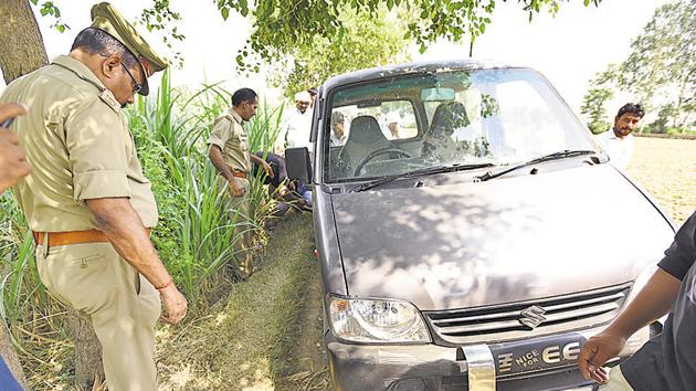 The car in which the eight family members were travelling to Bulandshahr from Jewar when they were robbed, four of them gang-raped and one man shot dead by armed assailants. (Virendra Singh Gosain/HT File) The car in which the eight family members were travelling to Bulandshahr from Jewar when they were robbed, four of them gang-raped and one man shot dead by armed assailants. (Virendra Singh Gosain/HT File)