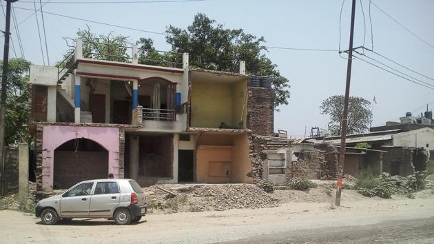 Homes being demolished for widening of the National Highway-74 at Rudrapur in US Nagar district. (HT Photo) Homes being demolished for widening of the National Highway-74 at Rudrapur in US Nagar district. (HT Photo)