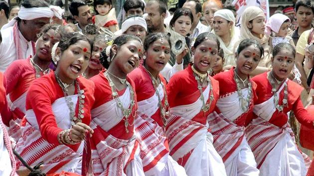 Tea tribes perform traditional dance in Guwahati. The tribe is among the six communities that BJP assured to include in the ST list. (PTI File Photo) Tea tribes perform traditional dance in Guwahati. The tribe is among the six communities that BJP assured to include in the ST list. (PTI File Photo)