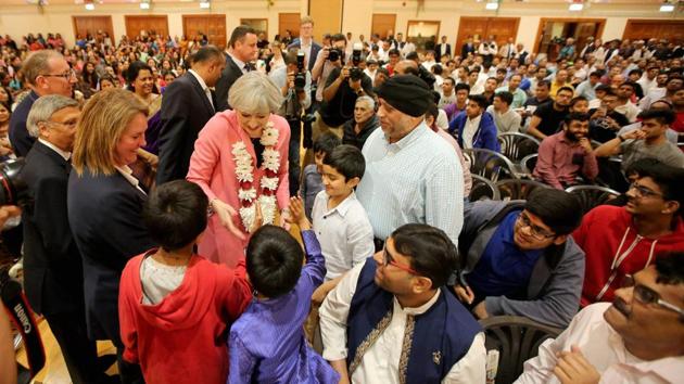 British Prime Minister Theresa May meeting devotees at BAPS Shri Swaminarayan Mandir, London on Saturday. British Prime Minister Theresa May meeting devotees at BAPS Shri Swaminarayan Mandir, London on Saturday.