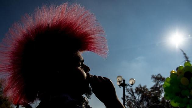 A demonstrator smokes a joint during the the ‘Grow your rights’ rally in Santiago, demanding the depenalization of Marijuana. (Martin BERNETTI / AFP) A demonstrator smokes a joint during the the ‘Grow your rights’ rally in Santiago, demanding the depenalization of Marijuana. (Martin BERNETTI / AFP)