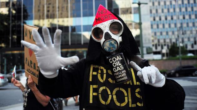 Environmental activists and supporters take part in a demonstration in New York, to protest US President Donald Trump's decision to pull out of the 195-nation Paris climate accord deal. US President Donald Trump earlier announced America is ‘getting out’ of a deal he said imposed ‘draconian’ burdens that would cost the US millions of jobs and billions in cold hard cash. (Jewel SAMAD / AFP) Environmental activists and supporters take part in a demonstration in New York, to protest US President Donald Trump's decision to pull out of the 195-nation Paris climate accord deal. US President Donald Trump earlier announced America is ‘getting out’ of a deal he said imposed ‘draconian’ burdens that would cost the US millions of jobs and billions in cold hard cash. (Jewel SAMAD / AFP)