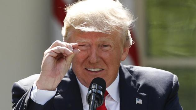 U.S. President Donald Trump refers to amounts of temperature change as he announces his decision that the United States will withdraw from the landmark Paris Climate Agreement, in the Rose Garden of the White House in Washington, U.S. (Kevin Lamarque REUTERS) U.S. President Donald Trump refers to amounts of temperature change as he announces his decision that the United States will withdraw from the landmark Paris Climate Agreement, in the Rose Garden of the White House in Washington, U.S. (Kevin Lamarque REUTERS)