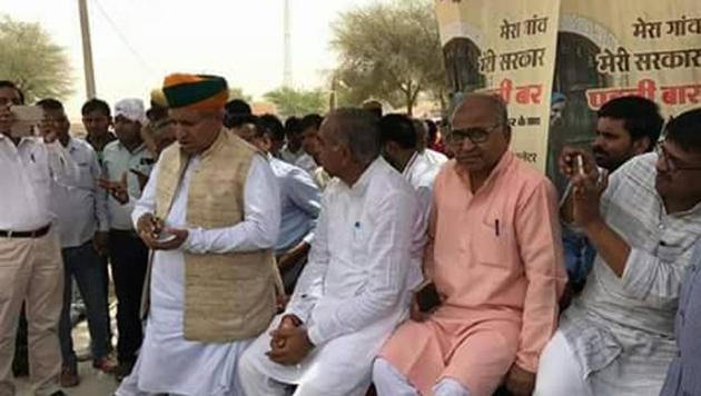 Union minister Arjun Ram Meghwal with villagers in Bikarner district in Rajasthan. (HT PHOTO) Union minister Arjun Ram Meghwal with villagers in Bikarner district in Rajasthan. (HT PHOTO)