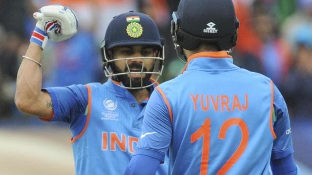 Indian cricket captain Virat Kohli congratulates teammate Yuvraj Singh for scoring fifty runs during the ICC Champions Trophy match against Pakistan. (AP) Indian cricket captain Virat Kohli congratulates teammate Yuvraj Singh for scoring fifty runs during the ICC Champions Trophy match against Pakistan. (AP)