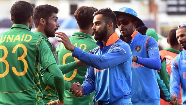 Virat Kohli (C) shakes hands with Pakistan players after the ICC Champions trophy match between India and Pakistan at Edgbaston in Birmingham. (AFP) Virat Kohli (C) shakes hands with Pakistan players after the ICC Champions trophy match between India and Pakistan at Edgbaston in Birmingham. (AFP)