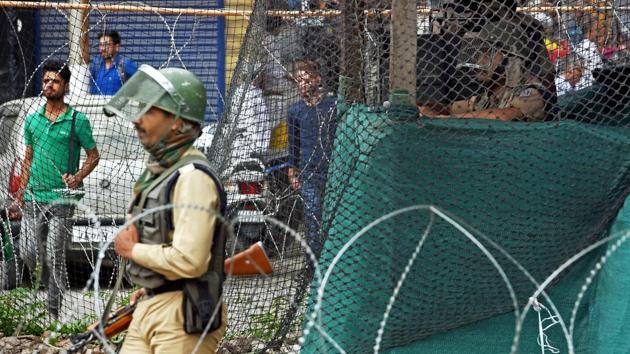 Security personnel keep vigil from a temporary bunker in Srinagar following the killing of four heavily armed militants who had tried to storm a CRPF camp in a pre-dawn suicide attack in Bandipora district of Jammu and Kashmir on Monday, June 5, 2017. (PTI) Security personnel keep vigil from a temporary bunker in Srinagar following the killing of four heavily armed militants who had tried to storm a CRPF camp in a pre-dawn suicide attack in Bandipora district of Jammu and Kashmir on Monday, June 5, 2017. (PTI)