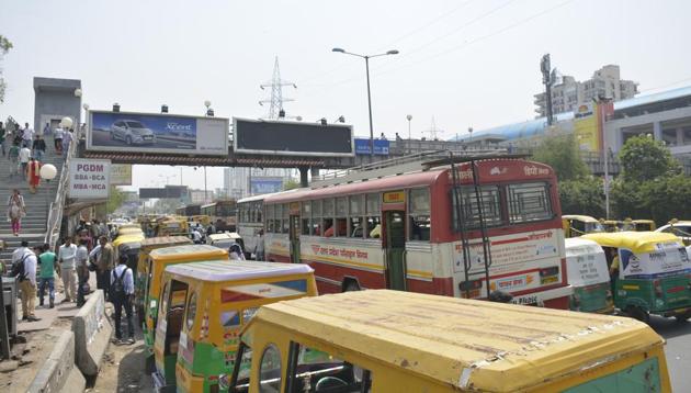 Unauthorised parking of autorickshaws and buses have eaten into the road space around the metro station. (Sakib Ali/HT Photo) Unauthorised parking of autorickshaws and buses have eaten into the road space around the metro station. (Sakib Ali/HT Photo)