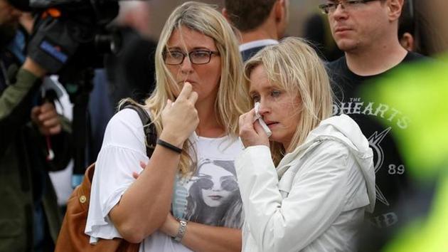 Onlookers react near the scene of the attack close to London Bridge in the central London district. (Peter Nicholls/REUTERS) Onlookers react near the scene of the attack close to London Bridge in the central London district. (Peter Nicholls/REUTERS)