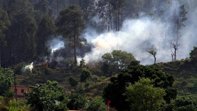 Smoke billows out after Pakistani army pounded a Rajouri area with mortar shells. (PTI file photo) Smoke billows out after Pakistani army pounded a Rajouri area with mortar shells. (PTI file photo)