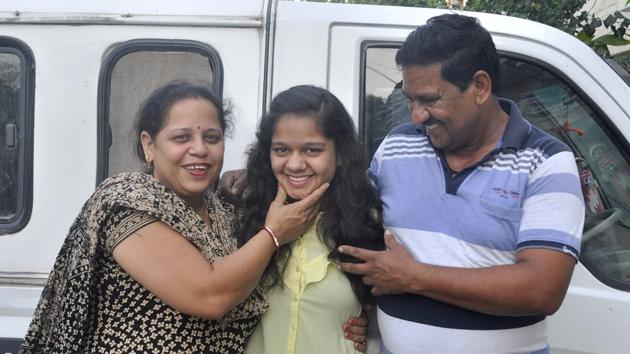 Radhika Kaushal (c) with her parents in Panchkula. (Sant Arora) Radhika Kaushal (c) with her parents in Panchkula. (Sant Arora)