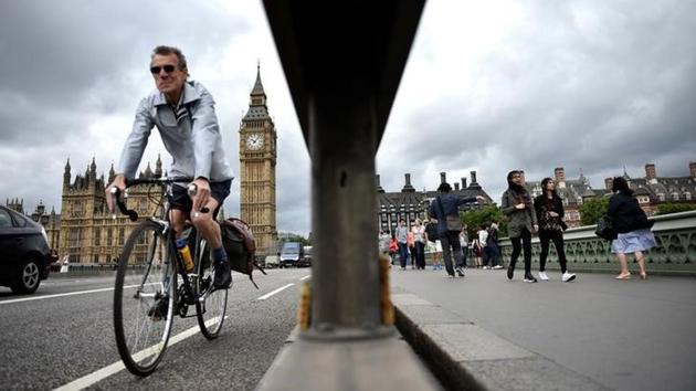 Pedestrians walk past barriers on Westminster Bridge in central London. (Hannah McKay/REUTERS) Pedestrians walk past barriers on Westminster Bridge in central London. (Hannah McKay/REUTERS)