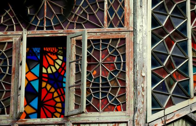 The ornate wooden doorways and crumbling facades of buildings are still untouched by the redevelopment which is altering the face of Tbilisi. (David Mdzinarishvili / REUTERS) The ornate wooden doorways and crumbling facades of buildings are still untouched by the redevelopment which is altering the face of Tbilisi. (David Mdzinarishvili / REUTERS)