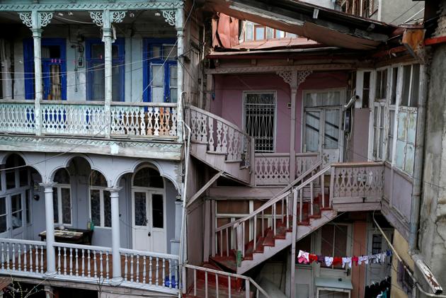 Wooden stairs and balconies are seen in a courtyard in the old town, Tbilisi. (David Mdzinarishvili / REUTERS) Wooden stairs and balconies are seen in a courtyard in the old town, Tbilisi. (David Mdzinarishvili / REUTERS)