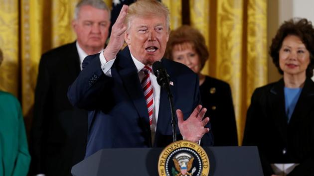 US President Donald Trump announces his initiative on air traffic control with transportation secretary Elaine Chao (right) at his side in the East Room of the White House in Washington, US, on June 5, 2017.(Reuters)
