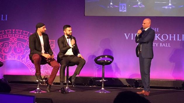 Harbhajan Singh (L) and Virat Kohli (C) at the charity event alongside stand-up comedian Vikram Sathaye (R). (Harbhajan Singh/Twitter) Harbhajan Singh (L) and Virat Kohli (C) at the charity event alongside stand-up comedian Vikram Sathaye (R). (Harbhajan Singh/Twitter)