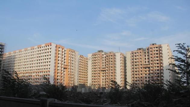 Approximately 1.80 lakh families from slums have shifted to SRA buildings.(HT FILE)