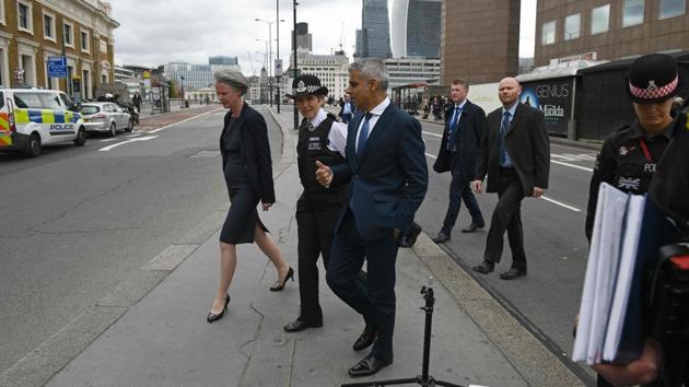 Metropolitan Police commissioner Cressida Dick (second from left) and London mayor Sadiq Khan (centre) are shown across the south side of London Bridge on June 5, 2017 to see the site of the terror attack. Khan has called on the UK government to cancel the proposed visit of US President Donald Trump, saying he was wrong on “many things”. (AFP) Metropolitan Police commissioner Cressida Dick (second from left) and London mayor Sadiq Khan (centre) are shown across the south side of London Bridge on June 5, 2017 to see the site of the terror attack. Khan has called on the UK government to cancel the proposed visit of US President Donald Trump, saying he was wrong on “many things”. (AFP)