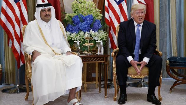 US President Donald Trump (right) holds a meeting with Qatar's Emir Sheikh Tamim Bin Hamad Al-Thani, in Riyadh, Saudi Arabia, on May 21.(AP File)