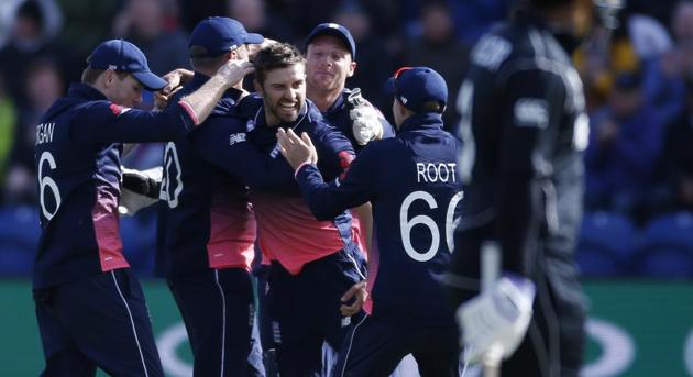 England players celebrate after the dismissal of a New Zealand batsman during their ICC Champions Trophy, Group A cricket match in Cardiff, Wales on Tuesday. Live streaming and live cricket score of England vs New Zealand was available online (REUTERS) England players celebrate after the dismissal of a New Zealand batsman during their ICC Champions Trophy, Group A cricket match in Cardiff, Wales on Tuesday. Live streaming and live cricket score of England vs New Zealand was available online (REUTERS)