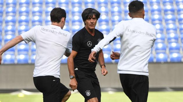 Germany national football team head coach Joachim Low (centre) oversees a training session in ahead of the friendly against Denmark national football team in Brondby, Denmark, on Monday. (AFP) Germany national football team head coach Joachim Low (centre) oversees a training session in ahead of the friendly against Denmark national football team in Brondby, Denmark, on Monday. (AFP)