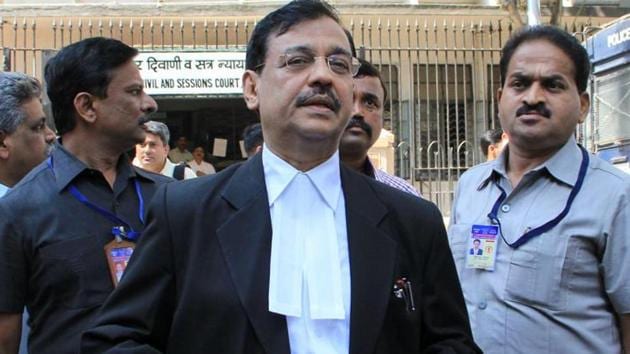 Ujjwal Nikam interacts with media outside the sessions court in Mumbai.(Bhushan Koyande/HT File Photo)