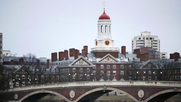 Rowers paddle along the Charles River past the Harvard College campus in Cambridge, Massachusetts. (AP File Photo) Rowers paddle along the Charles River past the Harvard College campus in Cambridge, Massachusetts. (AP File Photo)