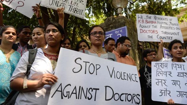 Doctors from different hospitals hold placards during a strike as they stand in front of The King Edward Memorial Hospital in Mumbai on March 23, 2017. (AFP File Photo) Doctors from different hospitals hold placards during a strike as they stand in front of The King Edward Memorial Hospital in Mumbai on March 23, 2017. (AFP File Photo)