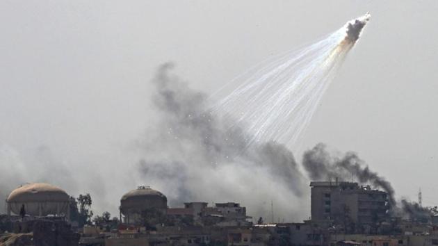 Smoke billows during a strike in a neighbourhood of west Mosul, during an ongoing offensive by Iraqi forces to retake the city from Islamic State (IS) group fighters. (AFP) Smoke billows during a strike in a neighbourhood of west Mosul, during an ongoing offensive by Iraqi forces to retake the city from Islamic State (IS) group fighters. (AFP)