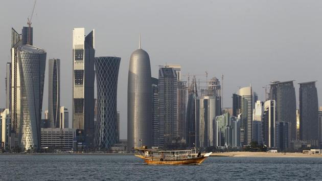 In this Jan. 6, 2011 file photo, a traditional dhow floats in the Corniche Bay of Doha, Qatar, with tall buildings of the financial district in the background. (AP Photo) In this Jan. 6, 2011 file photo, a traditional dhow floats in the Corniche Bay of Doha, Qatar, with tall buildings of the financial district in the background. (AP Photo)