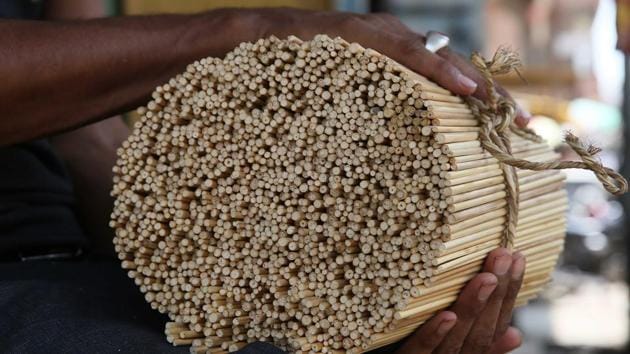 A Piyao maker holds sarkanda (cane grass) sticks to be supplied to icecream manufacturers. The declining piyao culture, has forced suppliers to shift to economically inferior crafts. (HimanSHU VYAS / HT PHOTO) A Piyao maker holds sarkanda (cane grass) sticks to be supplied to icecream manufacturers. The declining piyao culture, has forced suppliers to shift to economically inferior crafts. (HimanSHU VYAS / HT PHOTO)