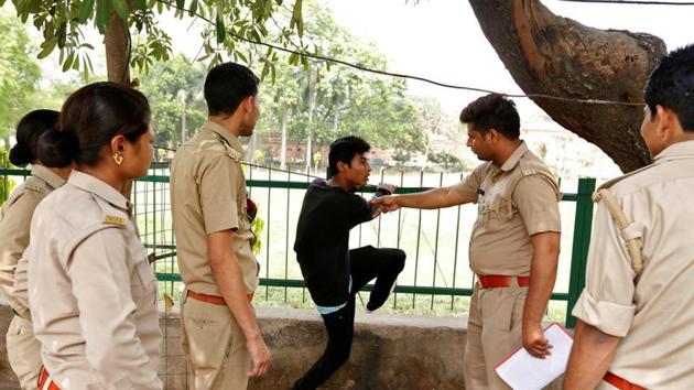 The anti-Romeo squad question a youth following regulations imposed by Uttar Pradesh Chief Minister Yogi Adityanath, Lucknow, India, April 6, 2017(REUTERS) The anti-Romeo squad question a youth following regulations imposed by Uttar Pradesh Chief Minister Yogi Adityanath, Lucknow, India, April 6, 2017(REUTERS)