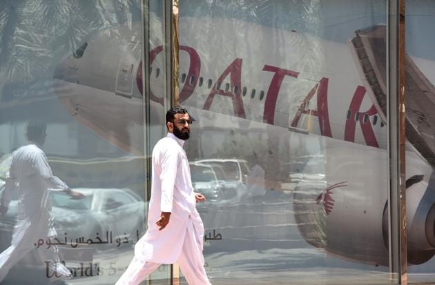 A man walks past the Qatar Airways branch in the Saudi capital Riyadh, after it had suspended all flights to Saudi Arabia following a severing of relations between major Gulf states and Qatar.(AFP Photo) A man walks past the Qatar Airways branch in the Saudi capital Riyadh, after it had suspended all flights to Saudi Arabia following a severing of relations between major Gulf states and Qatar.(AFP Photo)