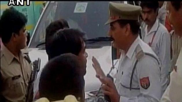 The incident happened during the evening rush hour, when the home guard saw a vehicle entering a congested one-way lane. (ANI Photo) The incident happened during the evening rush hour, when the home guard saw a vehicle entering a congested one-way lane. (ANI Photo)