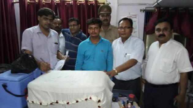 Mohd Arif in police custody. (HT Photo) Mohd Arif in police custody. (HT Photo)