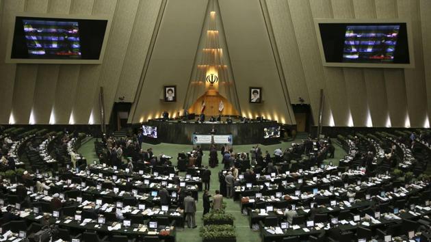 FILE - In this June 7, 2017 file photo, shows a general view inside Iran's parliament during the impeachment vote of the Education Minister Ali Asghar Fani, in Tehran, Iran. AP Photo/Vahid Salemi, File (Vahid Salemi/AP File )