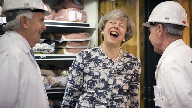 Britain's Prime Minister Theresa May visits Smithfield Market in the City of London on the final day of campaigning ahead of the general election. (AP) Britain's Prime Minister Theresa May visits Smithfield Market in the City of London on the final day of campaigning ahead of the general election. (AP)