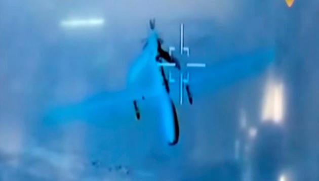 A still image taken from a footage broadcasted on Lebanese Hezbollah's Al Manar TV channel on June 7, 2017, shows what it said had been filmed by an Iranian drone showing what is said to be a U.S. military drone flying over southeast Syria.(REUTERS)