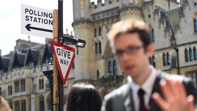 A sign points towards a polling station in Westminster the day before a general election. (Clodagh Kilcoyne/REUTERS) A sign points towards a polling station in Westminster the day before a general election. (Clodagh Kilcoyne/REUTERS)